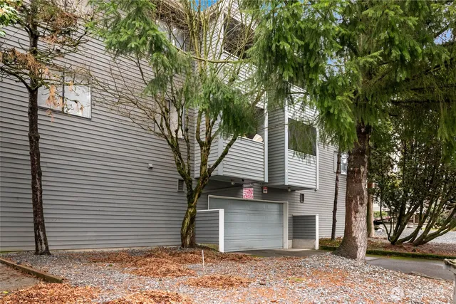 a front view of a house with a garage