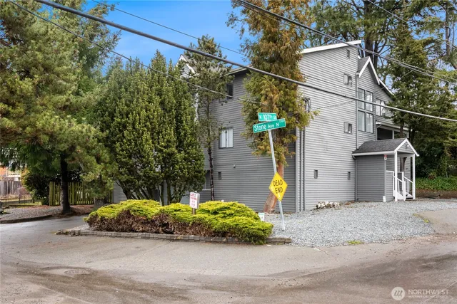 a view of a house with a yard and plants