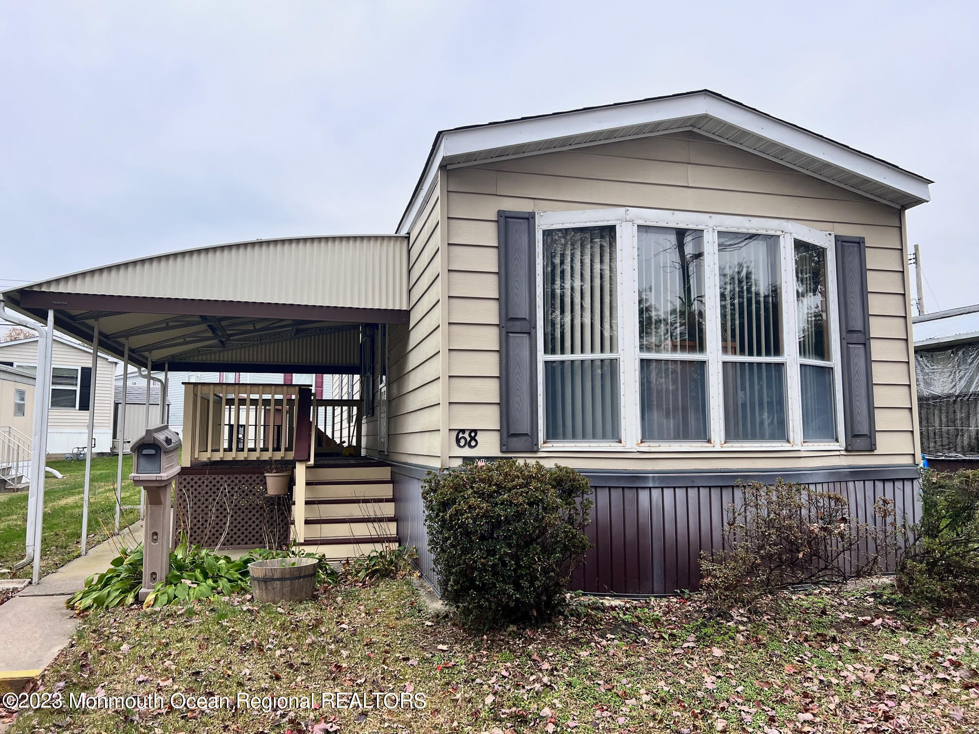 68 Shorehaven Road Hazlet, NJ 07730 - Photo 1 of 15 a front view of a house with garden