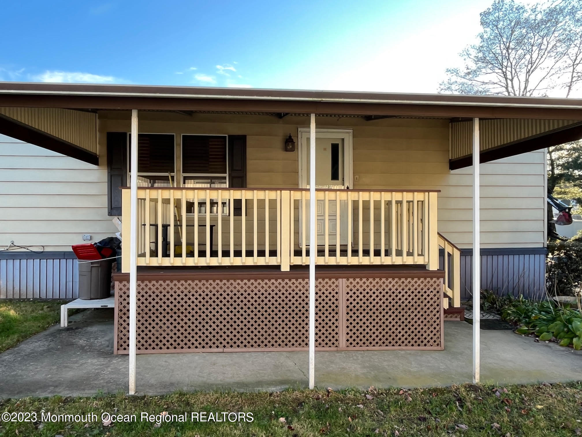 68 Shorehaven Road Hazlet, NJ 07730 - Photo 2 of 15 a view of a deck with a yard