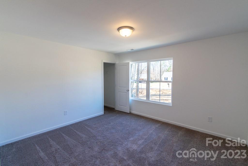 2173 Country Club Drive Lancaster, SC 29720 - Photo 15 of 18 an empty room with a window