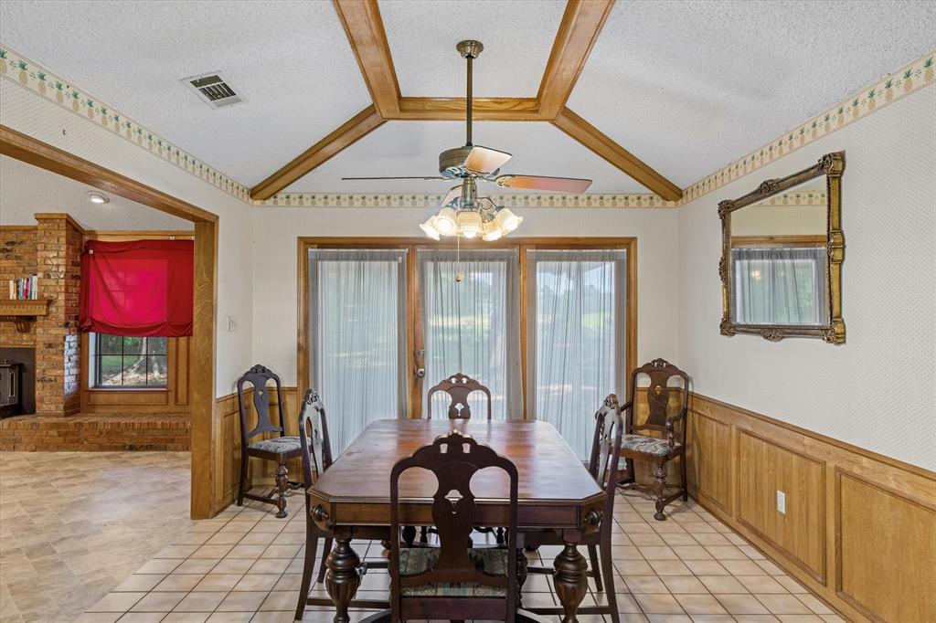 20880 State Highway 64 Canton, TX 75103 - Photo 11 of 36 a view of a dining room with furniture and chandelier