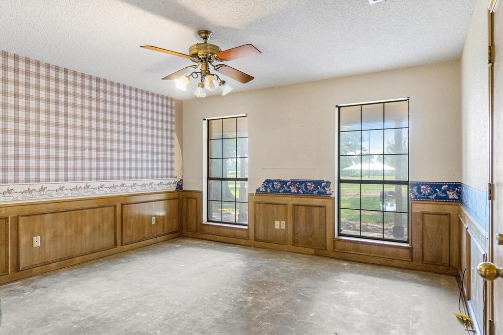 20880 State Highway 64 Canton, TX 75103 - Photo 18 of 36 a view of an empty room with window and cabinet