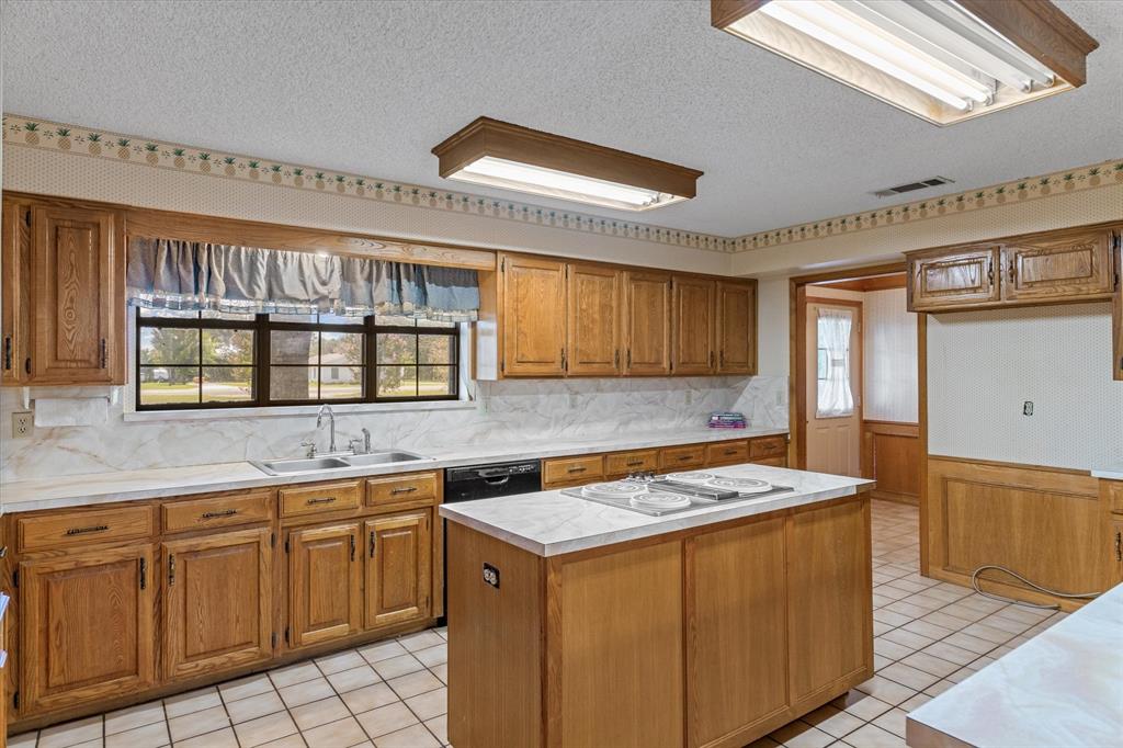20880 State Highway 64 Canton, TX 75103 - Photo 9 of 36 a kitchen that has a sink and a stove