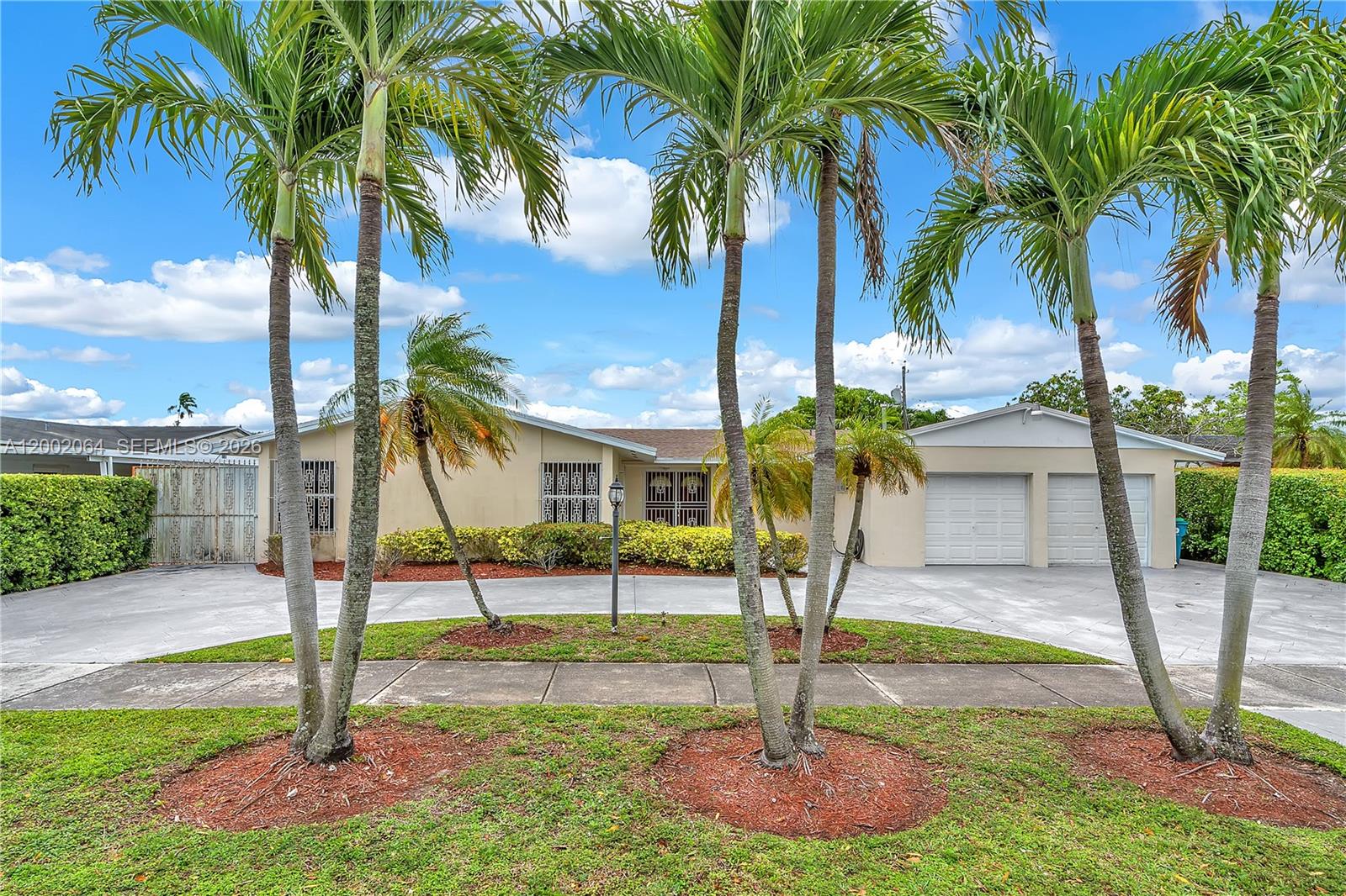 12310 Southwest 39th Terrace Miami, FL 33175 - Photo 1 of 42 a view of a yard with palm trees