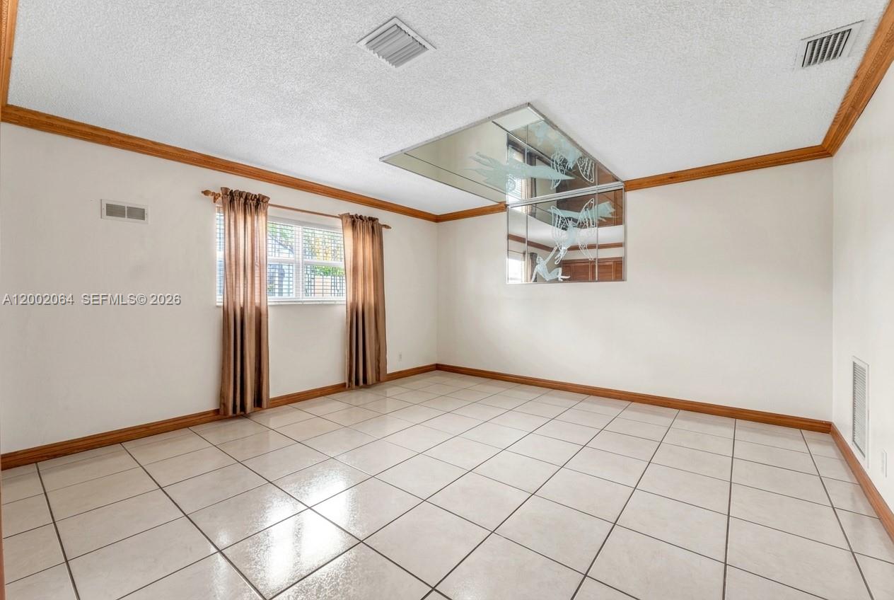 12310 Southwest 39th Terrace Miami, FL 33175 - Photo 18 of 42 a view of an empty room