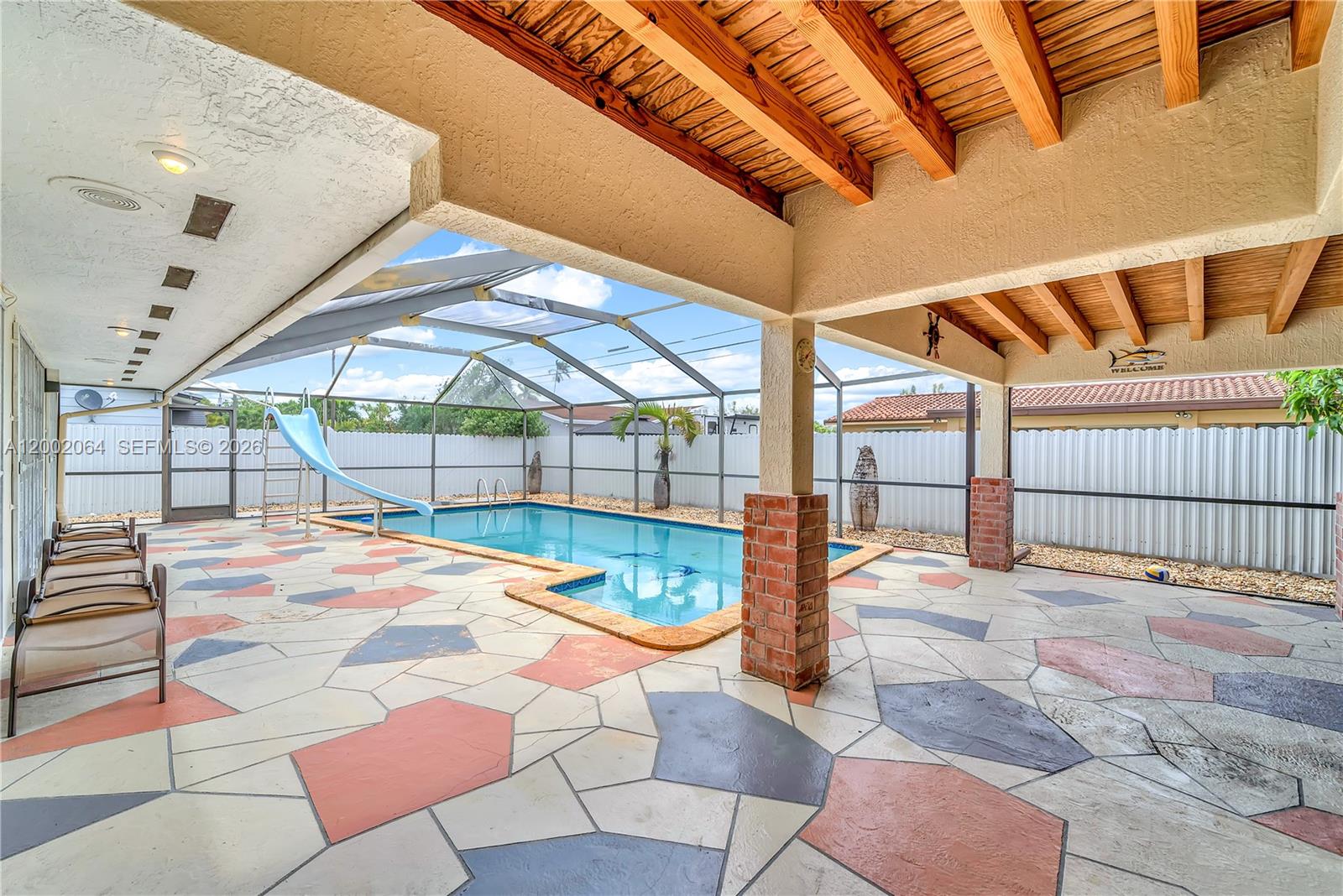 12310 Southwest 39th Terrace Miami, FL 33175 - Photo 19 of 42 a outdoor space with sitting space