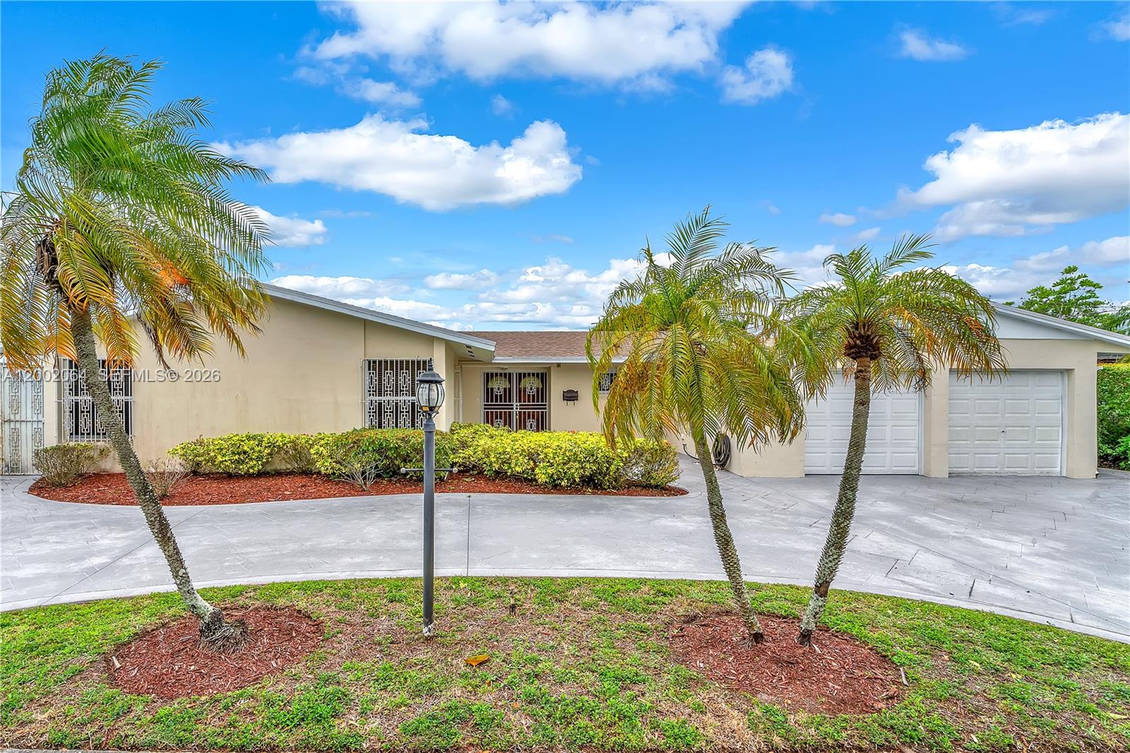 12310 Southwest 39th Terrace Miami, FL 33175 - Photo 2 of 42 a house view with a garden space