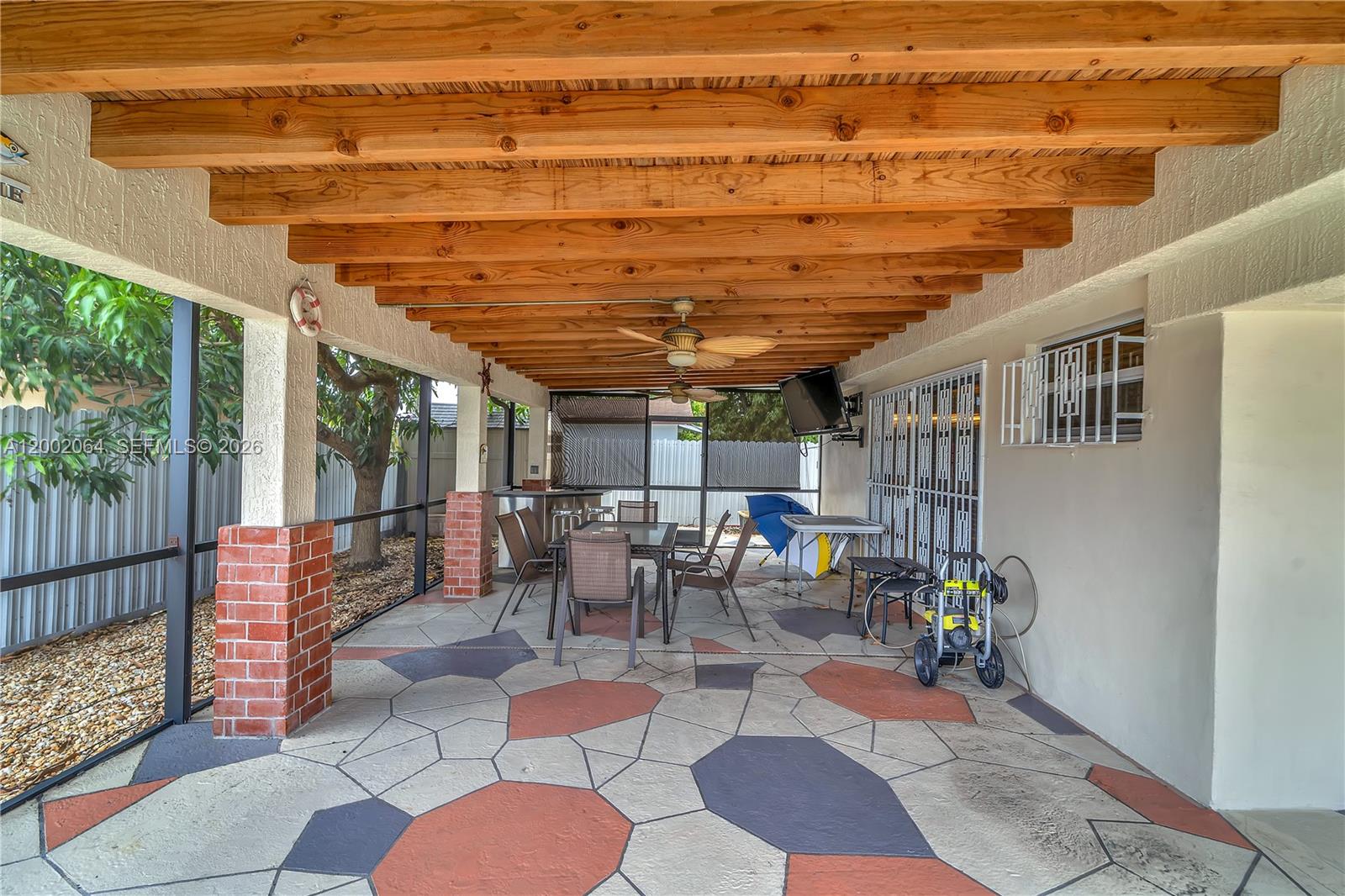 12310 Southwest 39th Terrace Miami, FL 33175 - Photo 23 of 42 a outdoor space with lots of tables and chairs