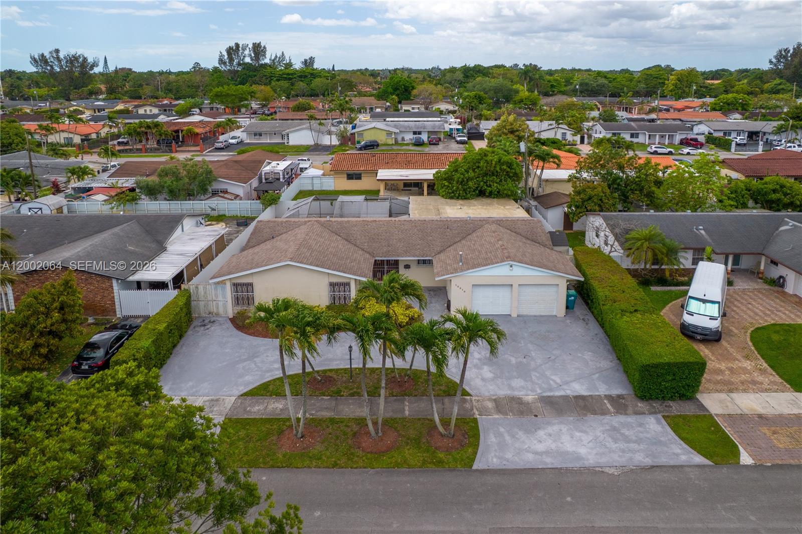 12310 Southwest 39th Terrace Miami, FL 33175 - Photo 29 of 42 an aerial view of residential houses with outdoor space