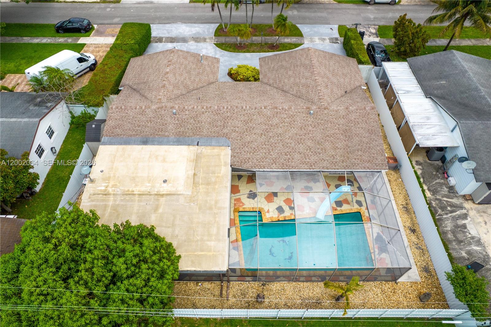 12310 Southwest 39th Terrace Miami, FL 33175 - Photo 41 of 42 an aerial view of a house with swimming pool and outdoor seating