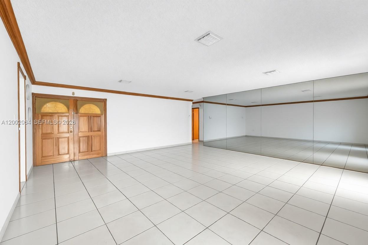 12310 Southwest 39th Terrace Miami, FL 33175 - Photo 7 of 42 a view of an empty room and window