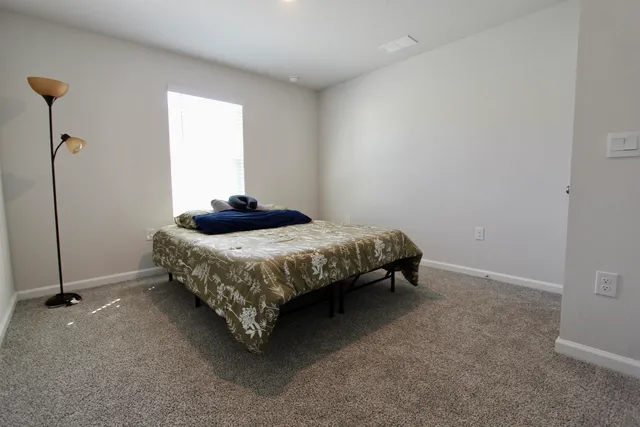 a kitchen with stainless steel appliances a refrigerator sink and microwave