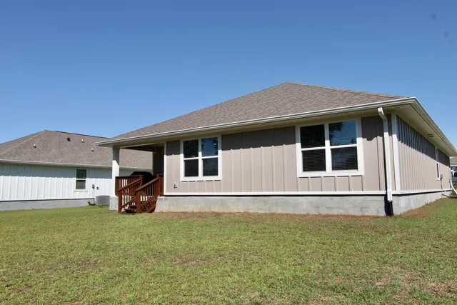 a house view with a garden space
