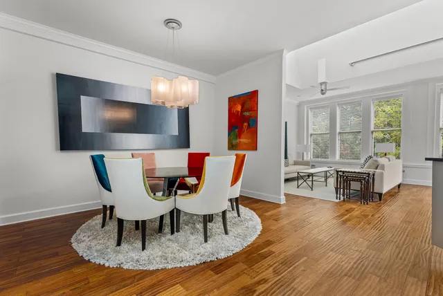 a dining room with furniture and window or wooden floor
