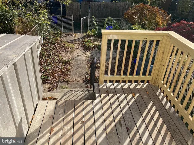 a view of a wooden fence