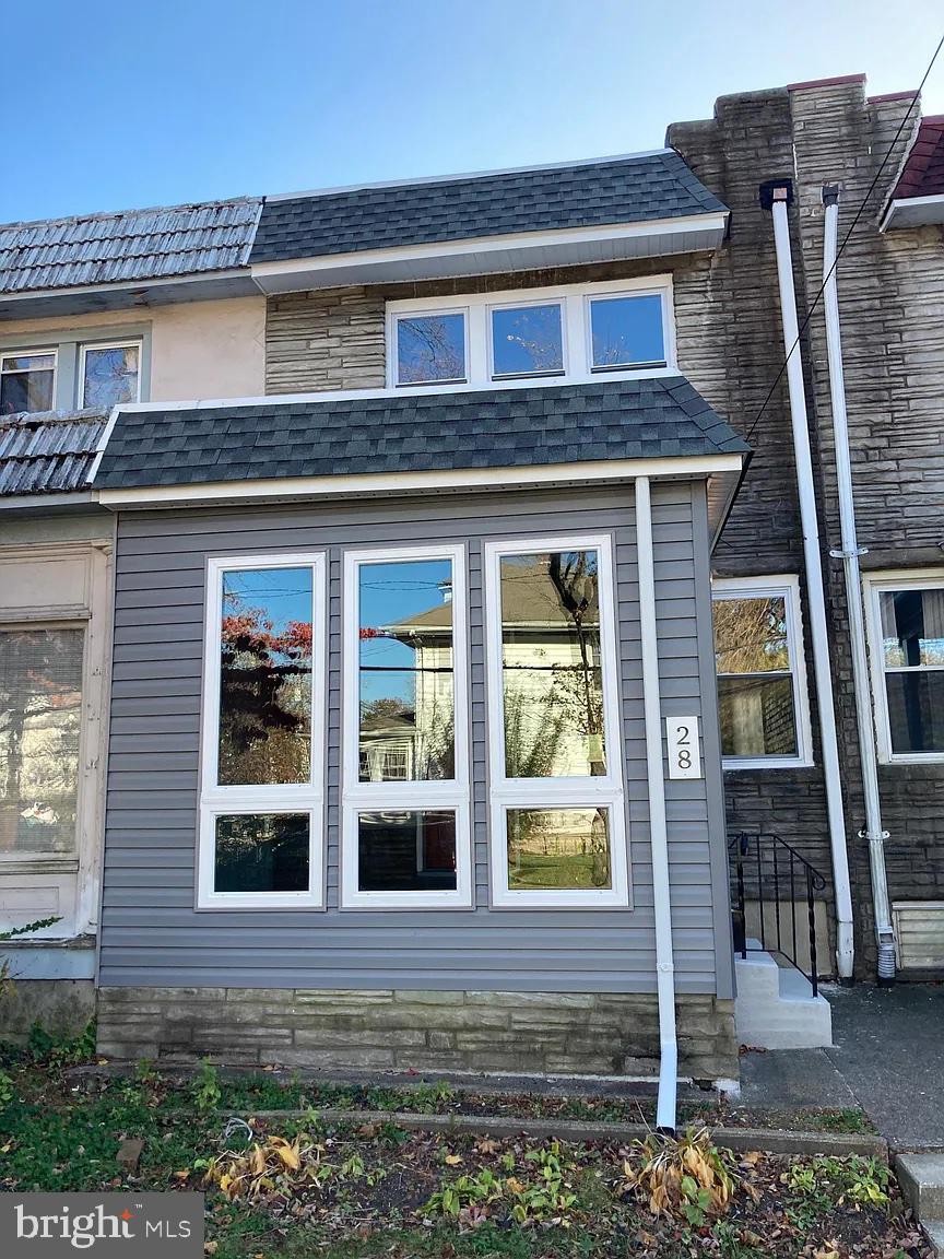 28 Locust Street Merchantville, NJ 08109 - Photo 10 of 10 a view of a brick building with large windows