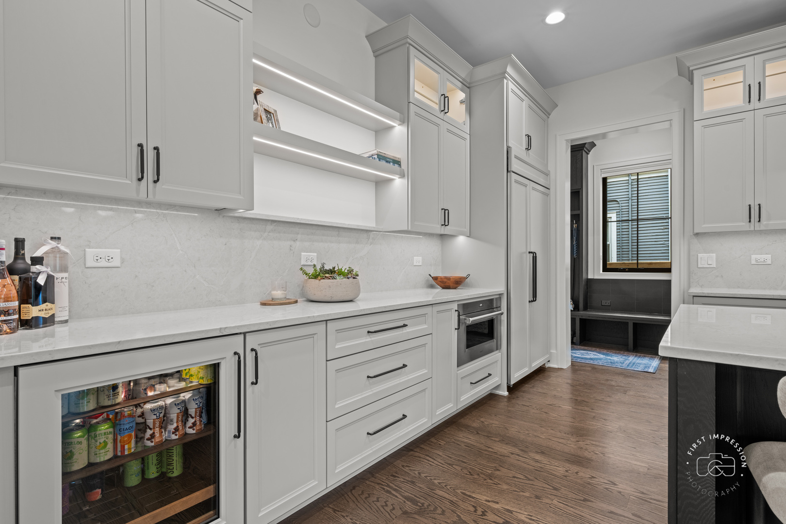 328 South Loomis Street Naperville, IL 60540 - Photo 12 of 47 a kitchen with cabinets and wooden floor