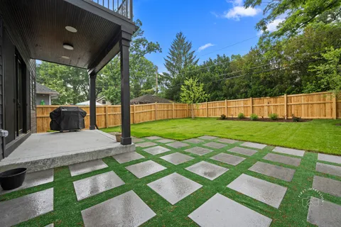 a view of a house with a garden