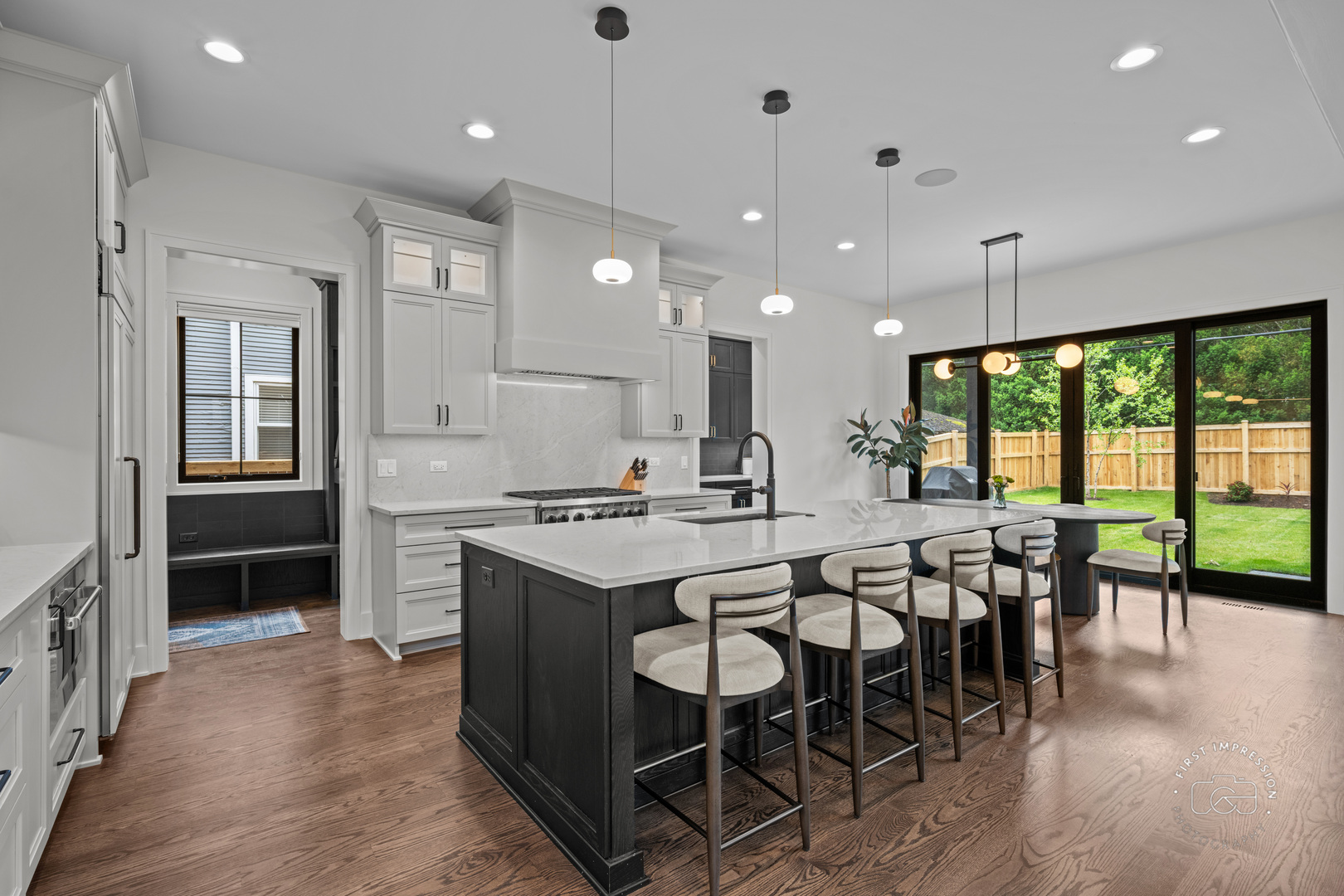 328 South Loomis Street Naperville, IL 60540 - Photo 5 of 47 a large kitchen with a table and chairs