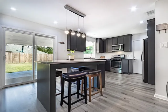 a view of entryway with wooden floor