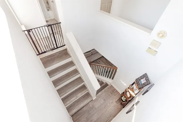 a bedroom with furniture and a bed