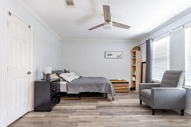 a house with swimming pool in front of it