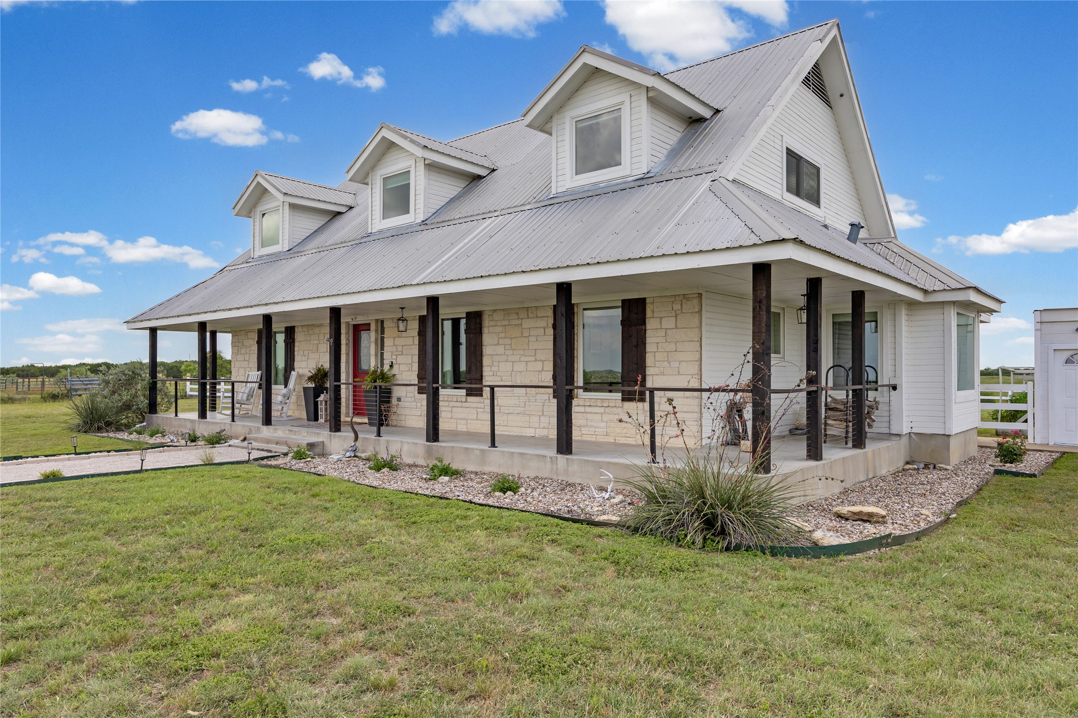 1283 Rattlesnake Trail Burnet, TX 78611 - Photo 7 of 39 a front view of a house with a yard