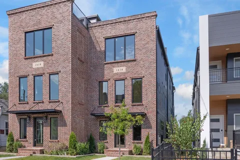 a view of a terrace with wooden floor and fence
