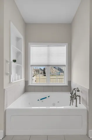 a view of a livingroom with furniture and a fireplace