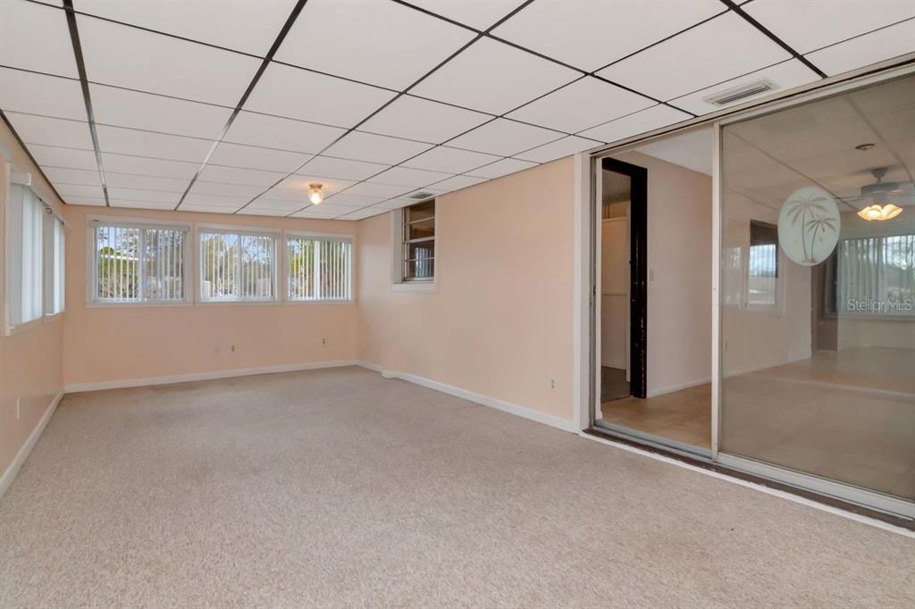 349 Old Welcome Road Lithia, FL 33547 - Photo 19 of 54 a view of empty room with floor to ceiling windows