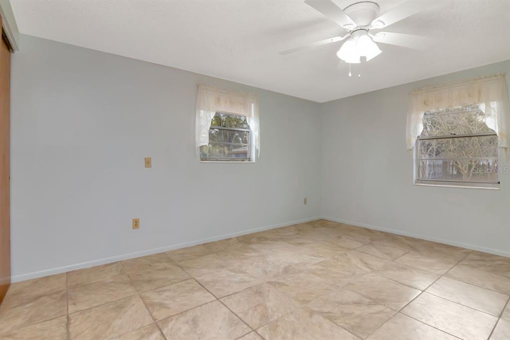 349 Old Welcome Road Lithia, FL 33547 - Photo 24 of 54 a view of an empty room with a window