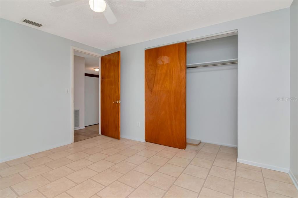 349 Old Welcome Road Lithia, FL 33547 - Photo 27 of 54 a view of an empty room with closet and a window
