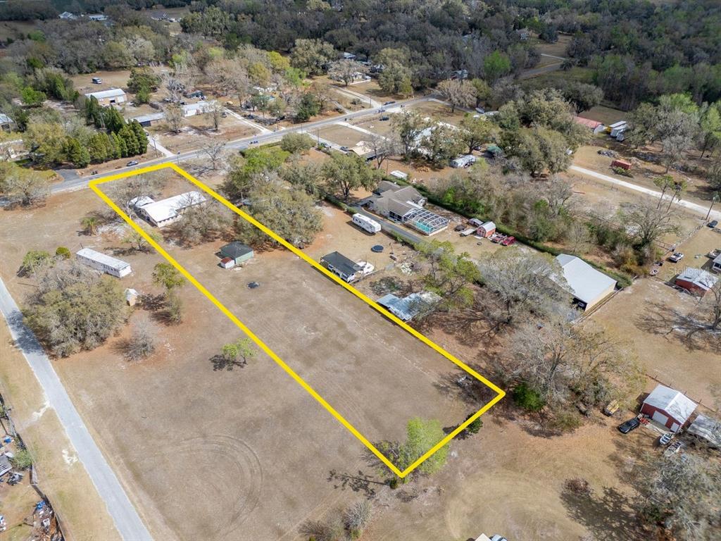 349 Old Welcome Road Lithia, FL 33547 - Photo 37 of 54 a view of swimming pool with a yard and ocean view