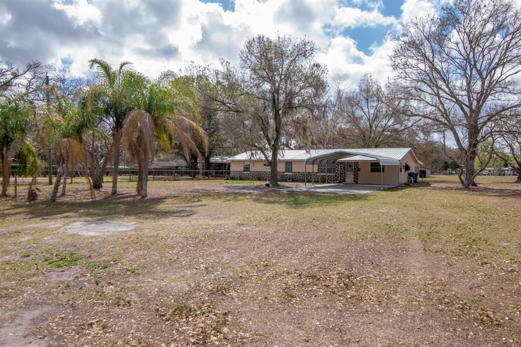 349 Old Welcome Road Lithia, FL 33547 - Photo 39 of 54 a view of street with houses