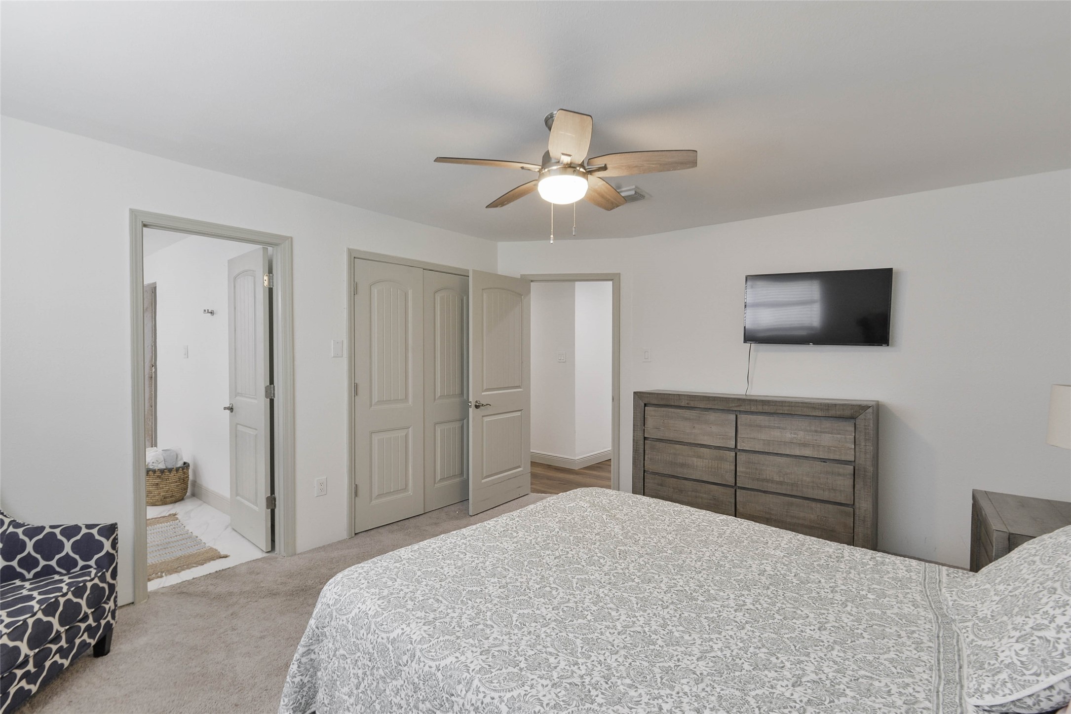531 Brandon Road Conroe, TX 77302 - Photo 15 of 33 a bedroom with a bed and a dresser
