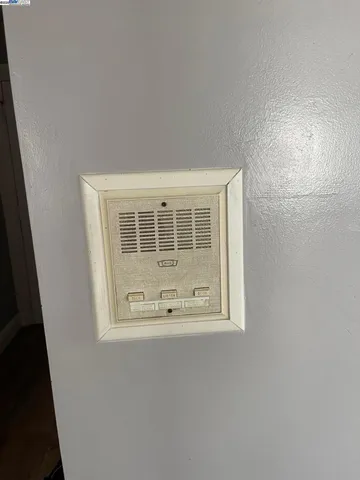 a view of a car park in front of brick building