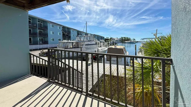 a view of balcony with wooden floor