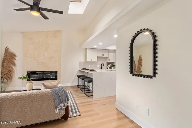 a living room with furniture and a table