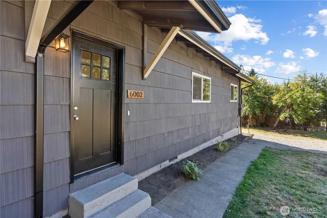 a backyard of a house with lots of green space