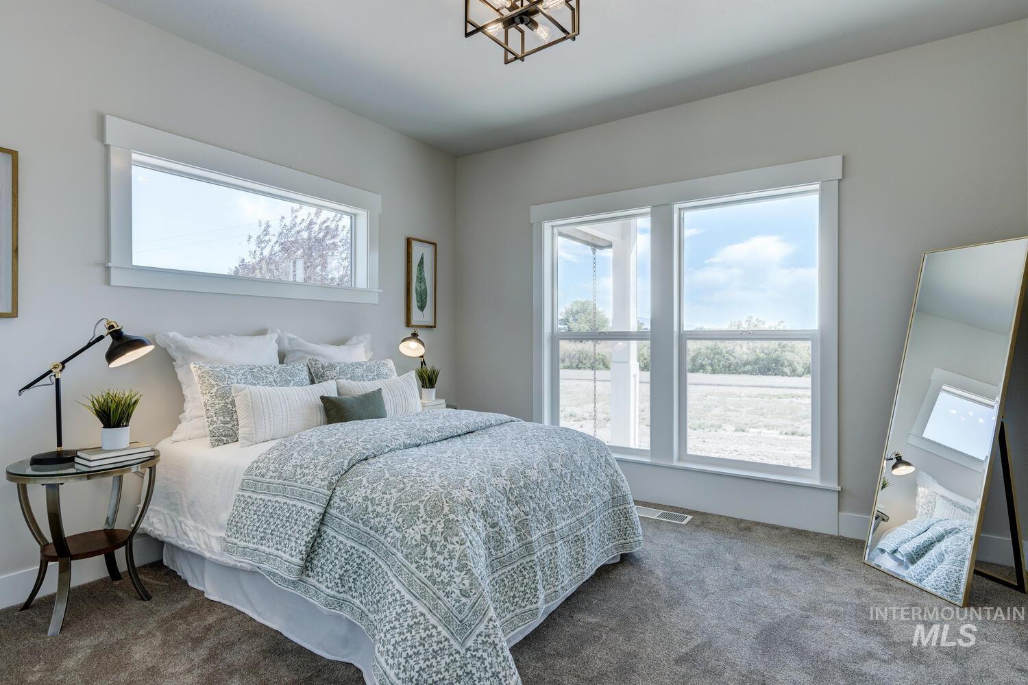 4695 County Line Road New Plymouth, ID 83655 - Photo 27 of 49 Carpeted bedroom with baseboards