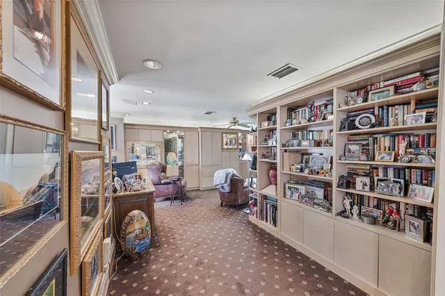 a view of a house with a yard and plants