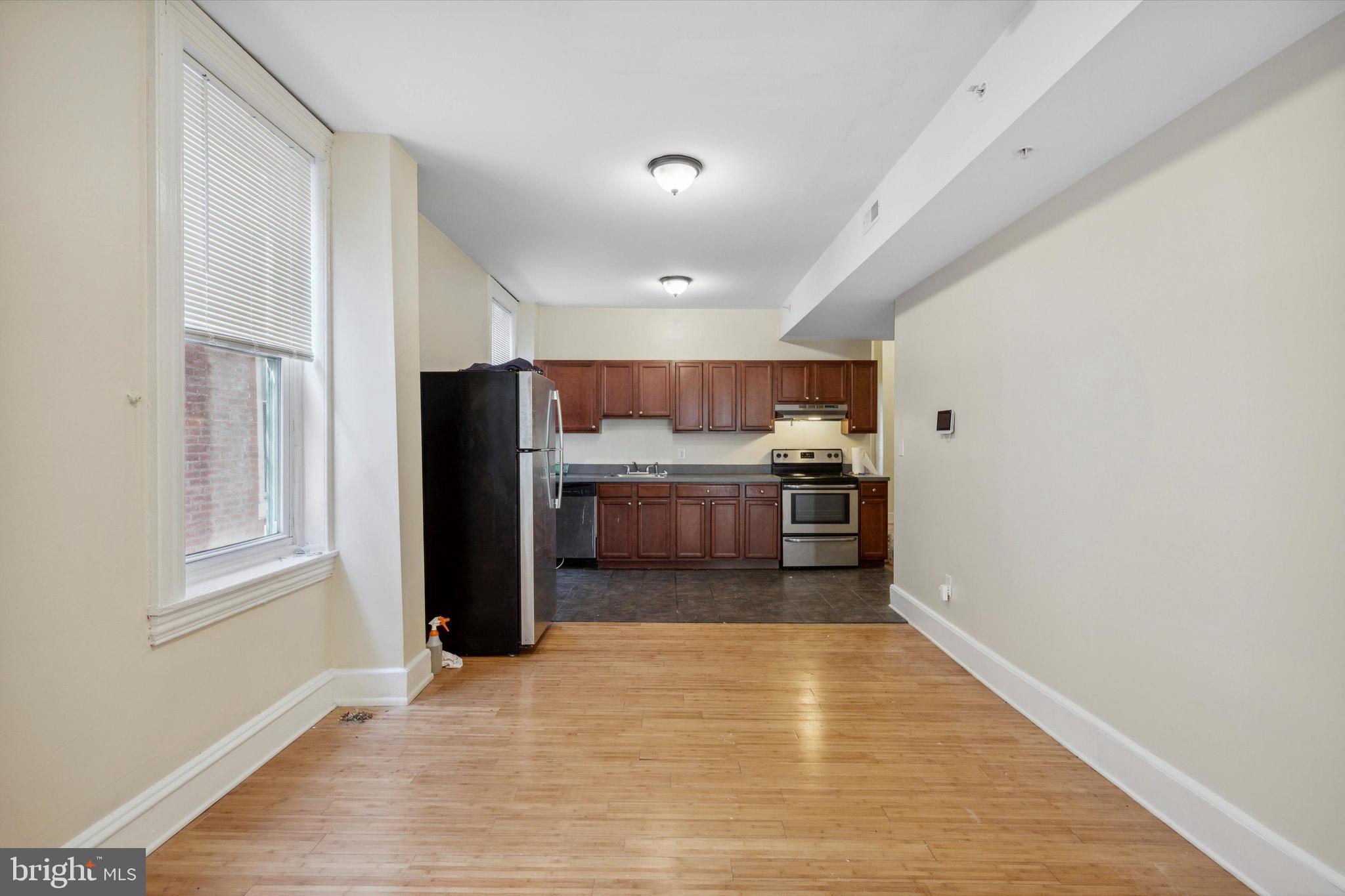 413 North Preston Street Philadelphia, PA 19104 - Photo 12 of 15 a view of kitchen with wooden floor