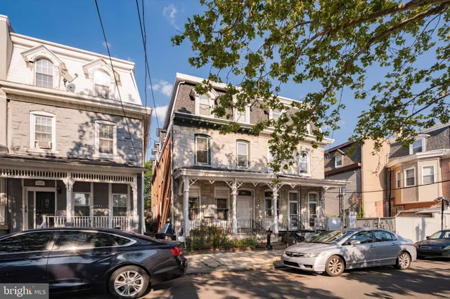 a car parked in front of a building