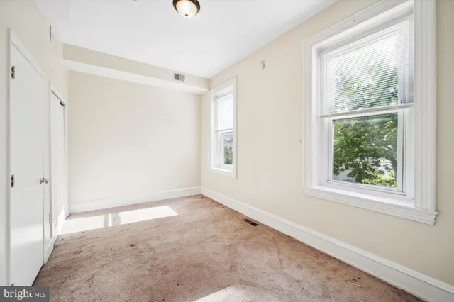 an empty room with a window