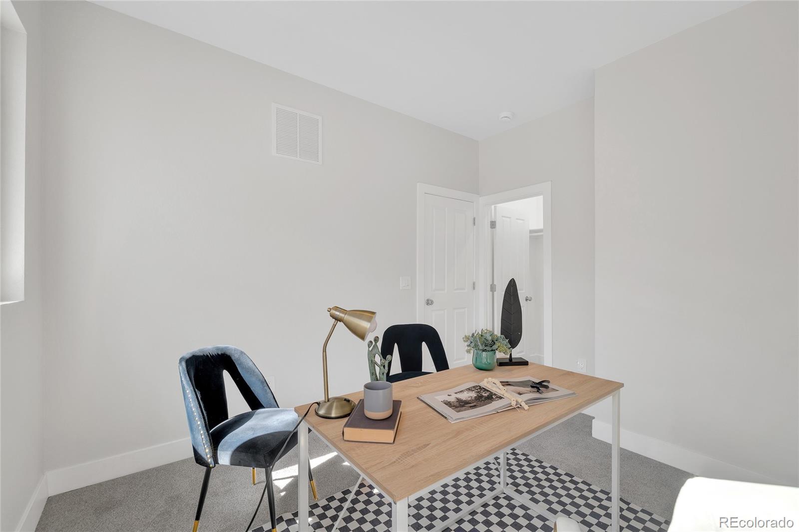 3512 High Street Denver, CO 80205 - Photo 20 of 33 a view of a workspace with furniture