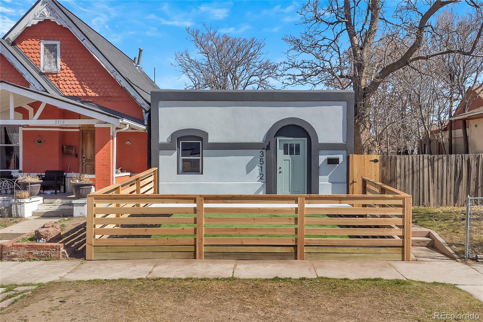 3512 High Street Denver, CO 80205 - Photo 26 of 33 a view of a house with a iron gate
