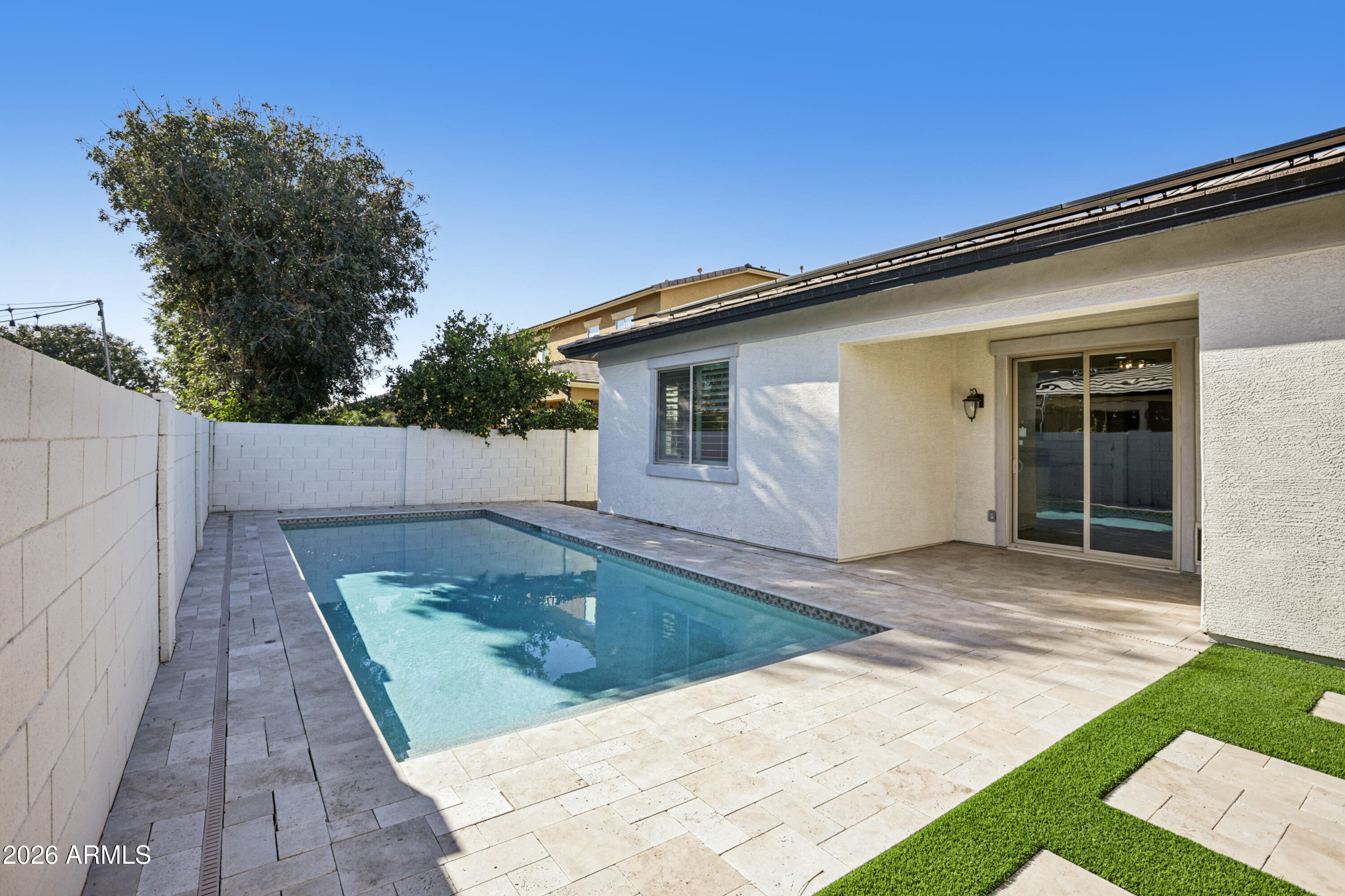 3959 East Morrison Ranch Parkway Gilbert, AZ 85296 - Photo 5 of 34 a backyard of a house