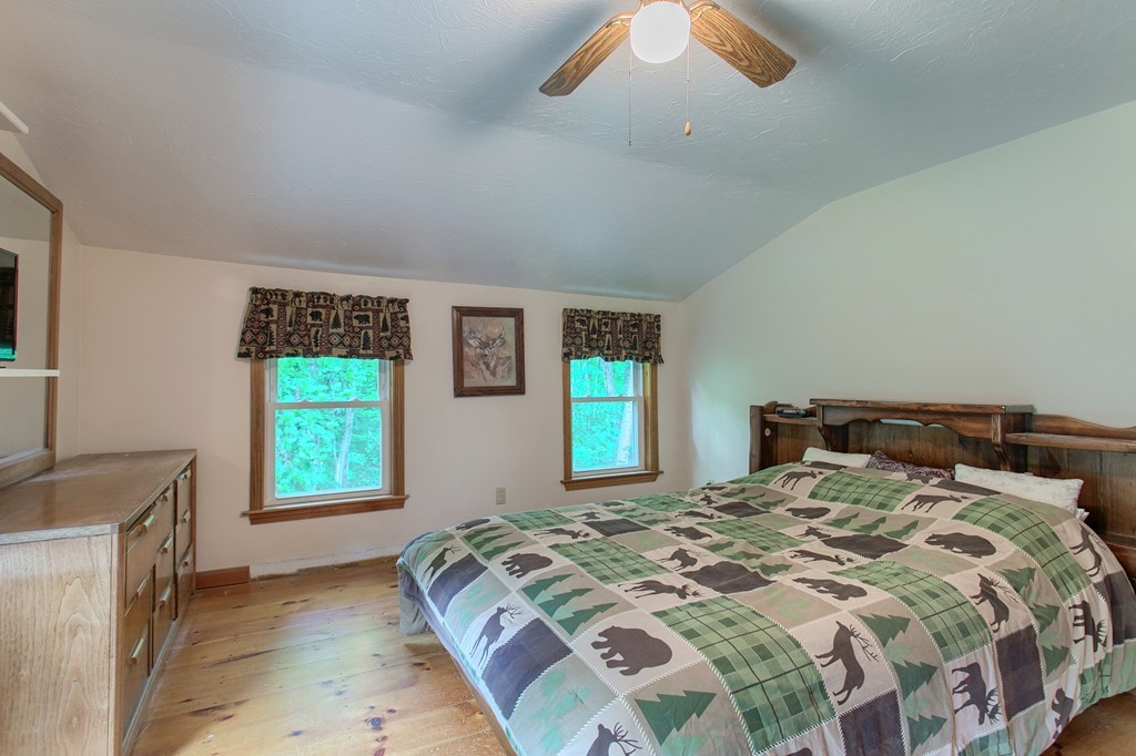 99 Mirick Road Princeton, MA 01541 - Photo 26 of 30 a bedroom with a bed and a window
