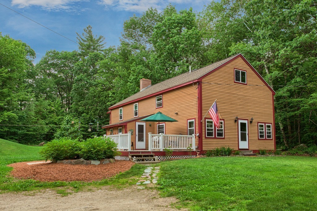 99 Mirick Road Princeton, MA 01541 - Photo 5 of 30 a view of a house with a yard